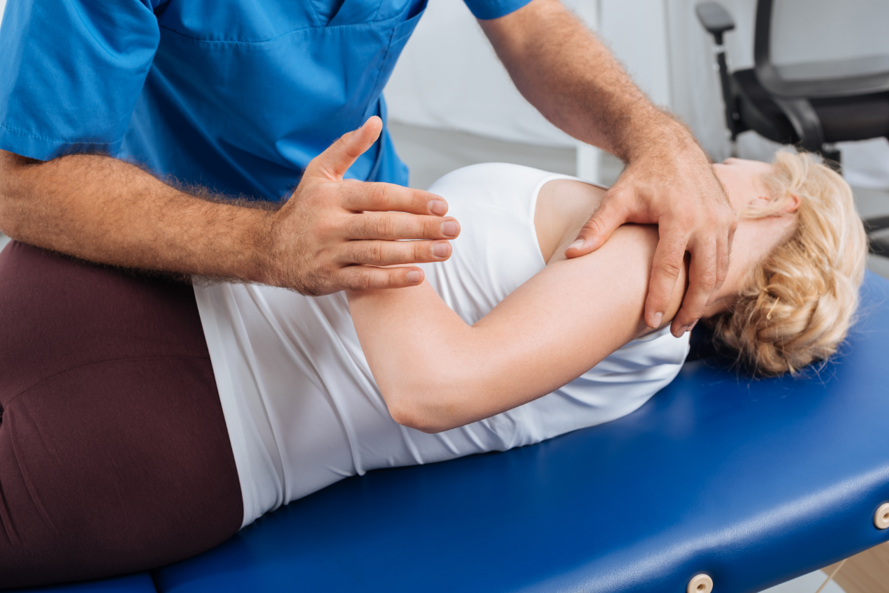 woman getting hand stretched